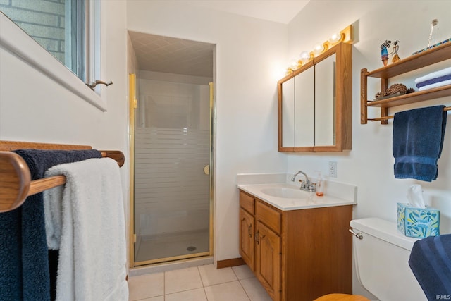 full bathroom with a shower stall, tile patterned floors, vanity, and toilet