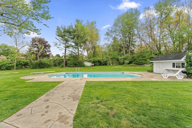 outdoor pool featuring a patio, an outbuilding, a lawn, and view of scattered trees
