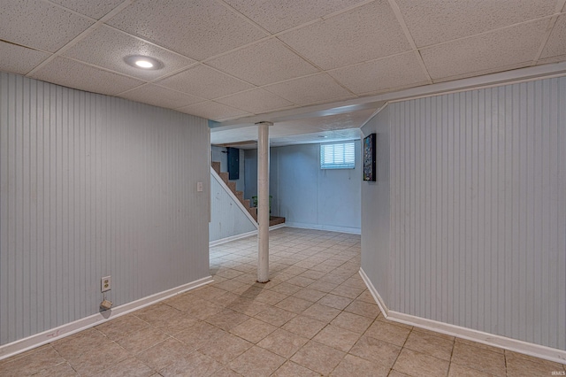1908 E Mulberry St, Evansville, IN 47714 - below grade area with stairs, baseboards, a drop ceiling, and recessed lighting