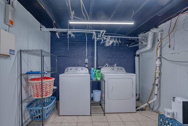 1908 E Mulberry St, Evansville, IN 47714 - laundry area featuring washing machine and clothes dryer and tile patterned floors