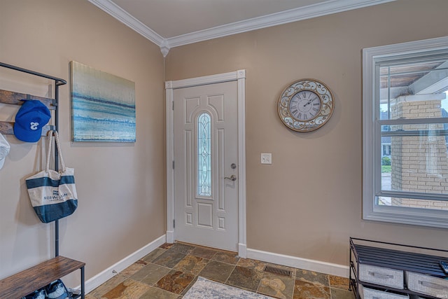 1908 E Mulberry St, Evansville, IN 47714 - foyer featuring baseboards, stone tile floors, and ornamental molding