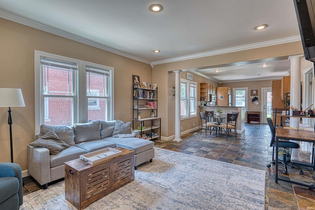 1908 E Mulberry St, Evansville, IN 47714 - living area featuring ornate columns, baseboards, stone tile floors, crown molding, and recessed lighting