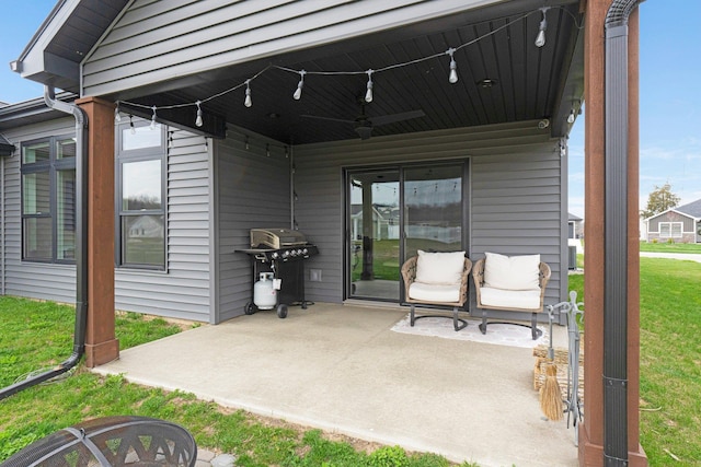 view of patio featuring a ceiling fan and area for grilling