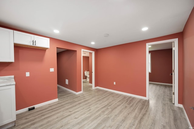 615 W Kickapoo St, Hartford City, IN 47348 - unfurnished room featuring light wood-style flooring, baseboards, and recessed lighting