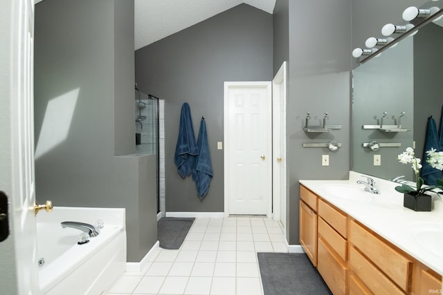 3630 E Tamarron Dr, Bloomington, IN 47408 - full bath with tile patterned floors, lofted ceiling, a shower with door, a garden tub, and double vanity