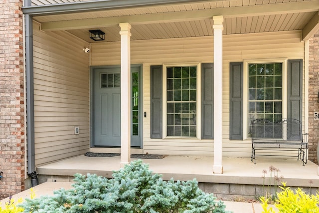 3630 E Tamarron Dr, Bloomington, IN 47408 - doorway to property featuring a porch