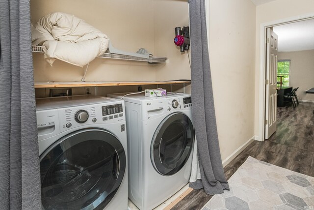 3630 E Tamarron Dr, Bloomington, IN 47408 - clothes washing area featuring washing machine and clothes dryer, wood finished floors, and baseboards