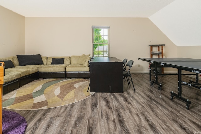 3630 E Tamarron Dr, Bloomington, IN 47408 - living room featuring wood finished floors, lofted ceiling, and baseboards