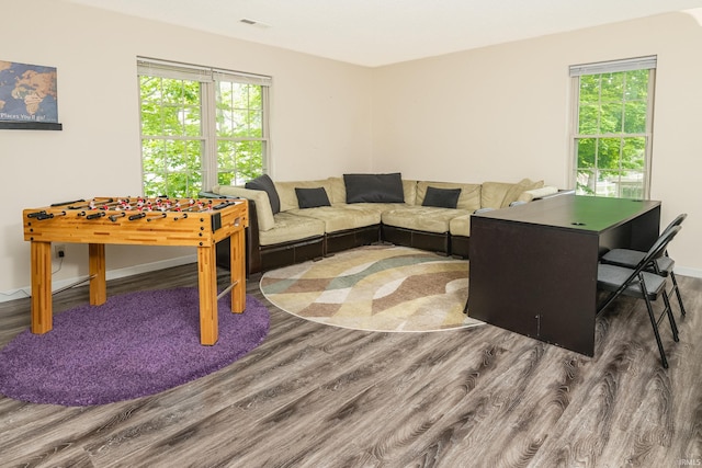 3630 E Tamarron Dr, Bloomington, IN 47408 - living area featuring wood finished floors and healthy amount of natural light