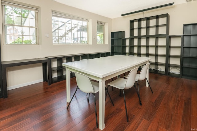 3630 E Tamarron Dr, Bloomington, IN 47408 - dining area with dark wood-type flooring and baseboards