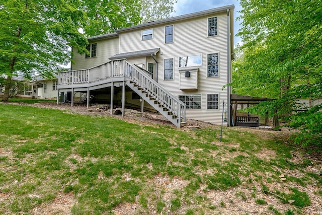 3630 E Tamarron Dr, Bloomington, IN 47408 - rear view of property featuring stairs, a deck, and a yard