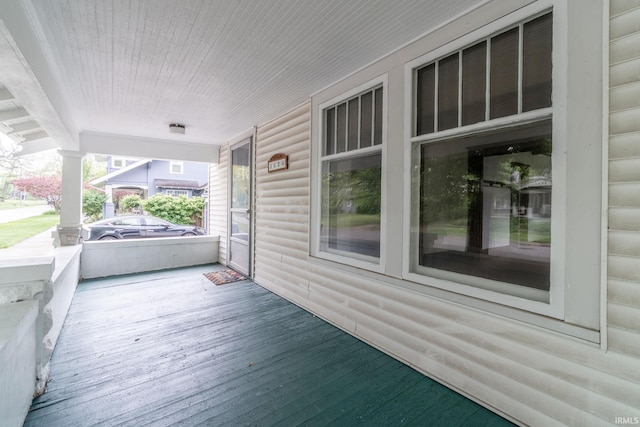 wooden terrace with covered porch