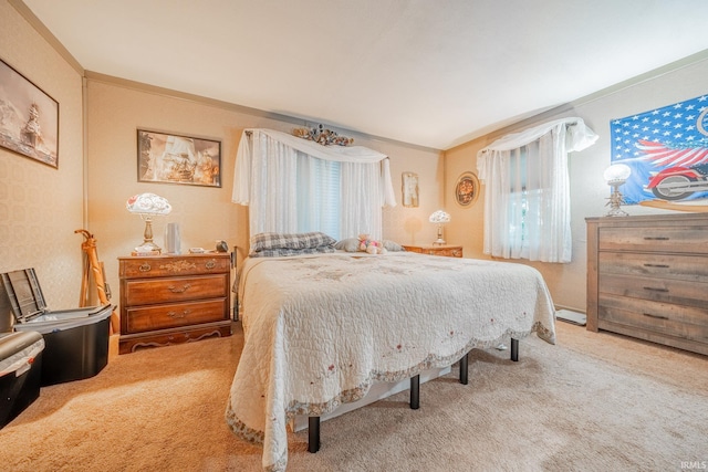carpeted bedroom featuring crown molding