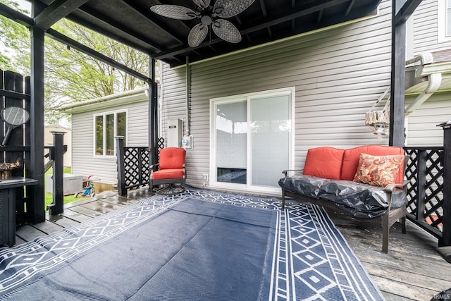 view of patio / terrace featuring a ceiling fan and a wooden deck