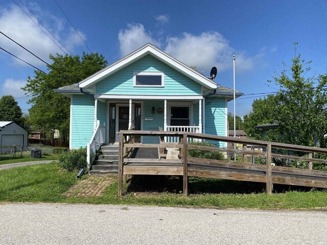 1107 S St, Bedford, IN 47421 - bungalow featuring a porch and central AC