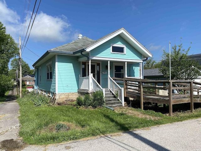 1107 S St, Bedford, IN 47421 - view of front of property with covered porch and a shingled roof