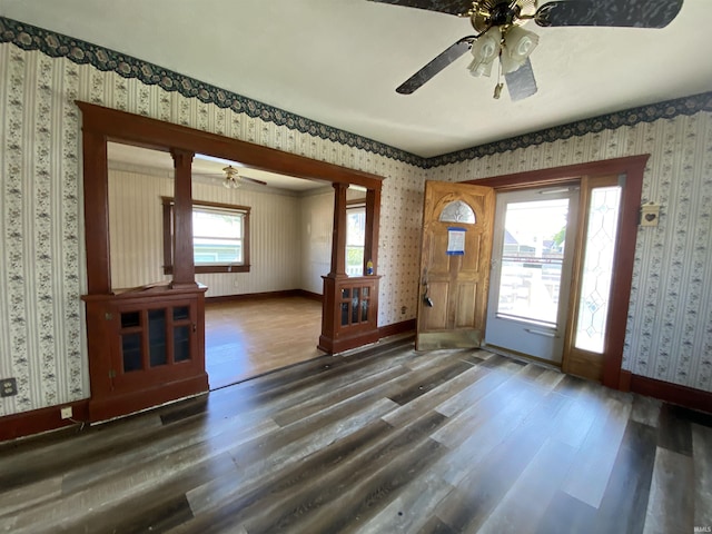 1107 S St, Bedford, IN 47421 - foyer with wallpapered walls, a ceiling fan, wood finished floors, and baseboards