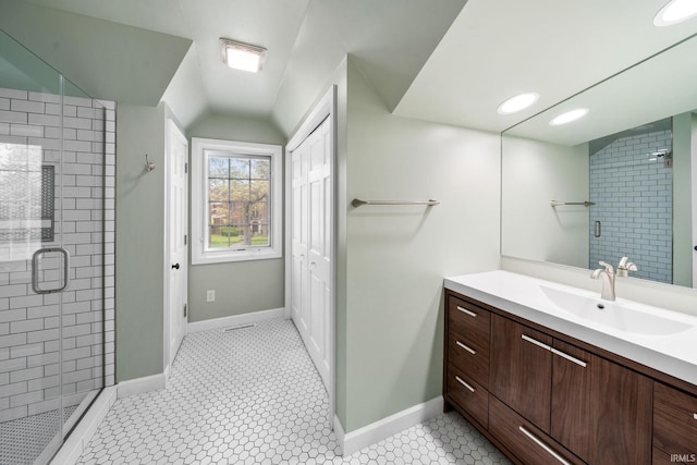 227 N Twyckenham Dr, South Bend, IN 46617 - full bathroom with a stall shower, vanity, and baseboards