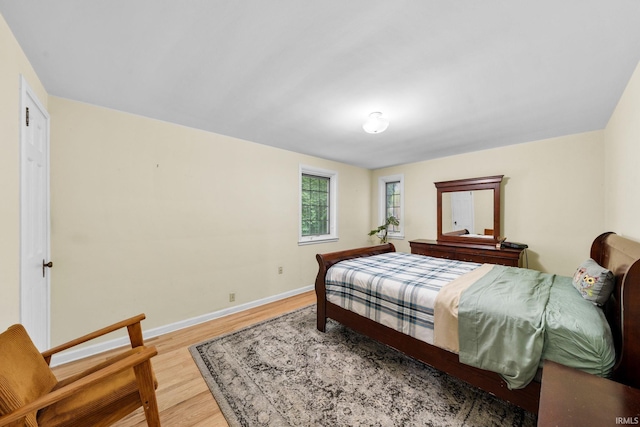 227 N Twyckenham Dr, South Bend, IN 46617 - bedroom featuring wood finished floors and baseboards