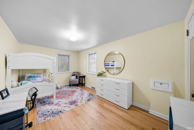 227 N Twyckenham Dr, South Bend, IN 46617 - bedroom featuring light wood finished floors and baseboards