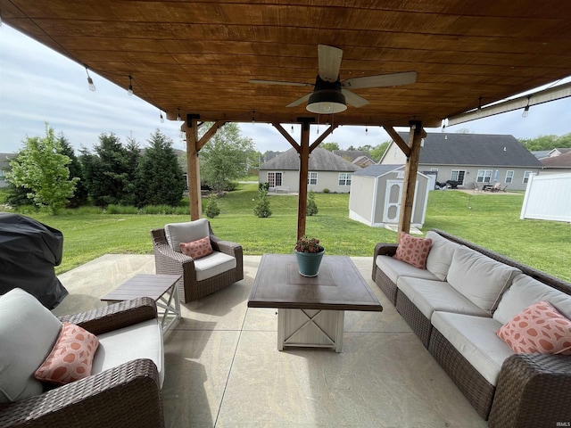 2327 Jamaica Ct, Evansville, IN 47725 - view of patio featuring an outdoor living space, a shed, an outdoor structure, ceiling fan, and a grill