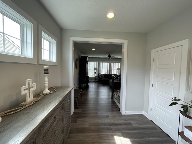 2327 Jamaica Ct, Evansville, IN 47725 - hallway featuring dark wood-style floors, recessed lighting, and baseboards