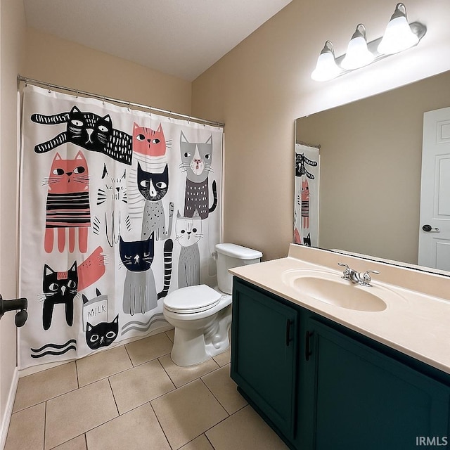 full bathroom with tile patterned floors, toilet, vanity, and a shower with shower curtain