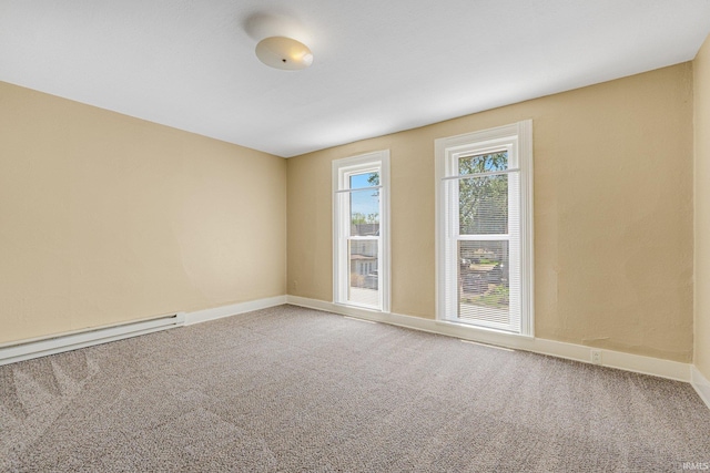 unfurnished room with light carpet, baseboards, and baseboard heating