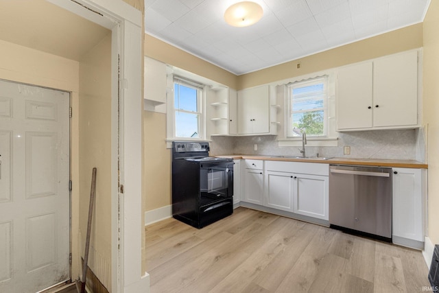 kitchen with black range with electric cooktop, stainless steel dishwasher, a sink, decorative backsplash, and white cabinetry