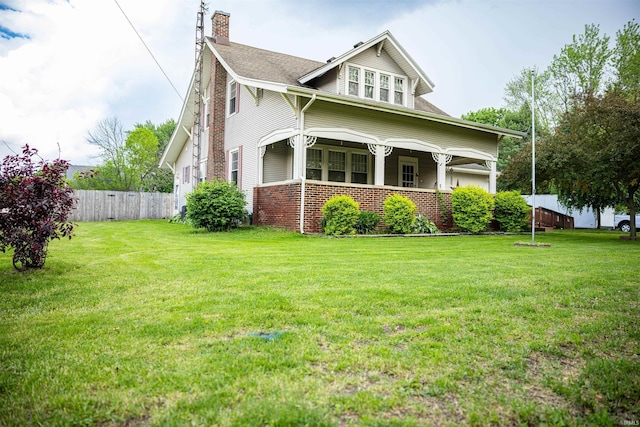 281 Dayton Rd, Dayton, IN 47941 - view of front of property featuring a porch, a chimney, and brick siding
