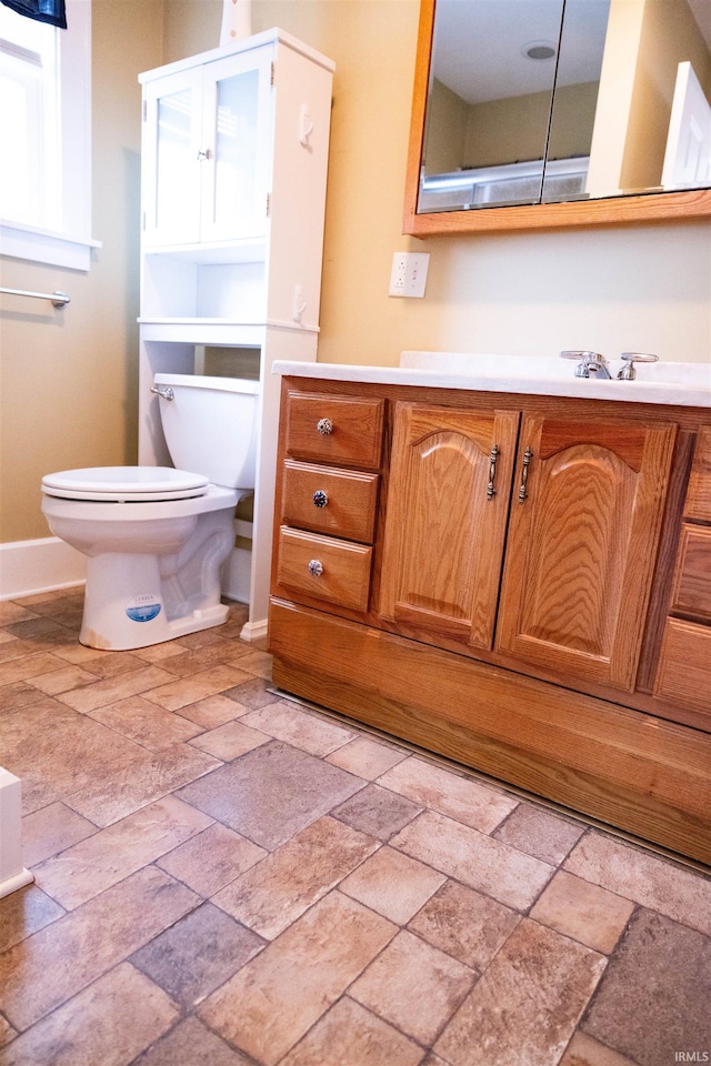 281 Dayton Rd, Dayton, IN 47941 - bathroom featuring toilet, stone tile flooring, and baseboards
