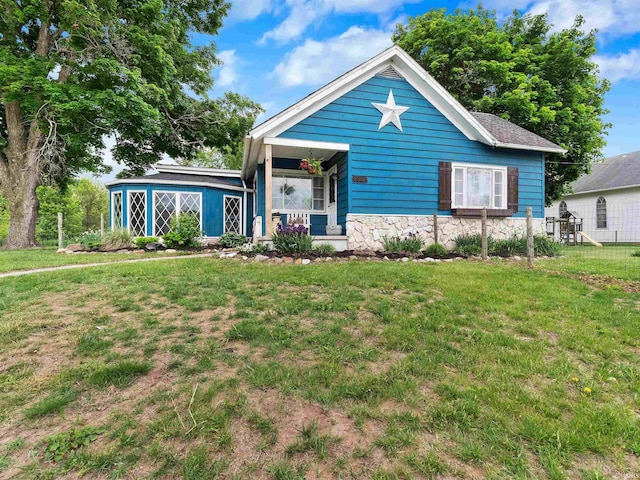 8880 W State Road 14, South Whitley, IN 46787 - view of front of property with a front yard and stone siding