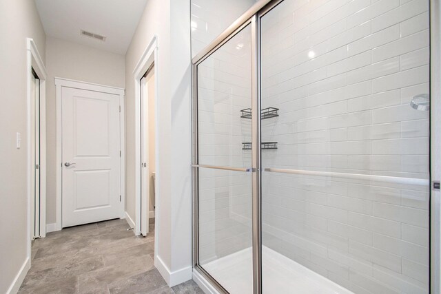 1740301W S Bend Ave, South Bend, IN 46637 - bathroom with a shower stall and baseboards