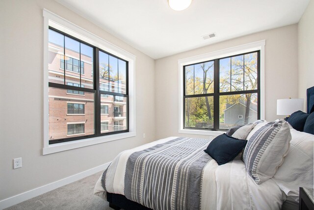 1740301W S Bend Ave, South Bend, IN 46637 - carpeted bedroom with multiple windows and baseboards