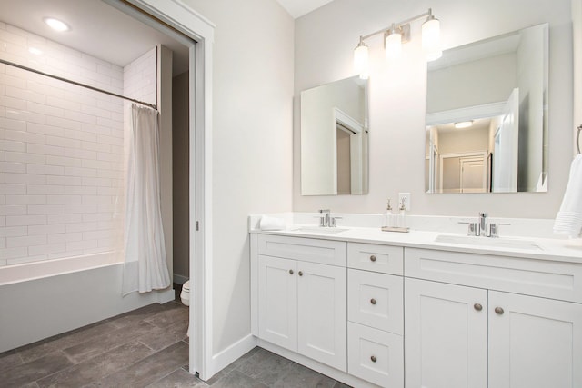 1740301W S Bend Ave, South Bend, IN 46637 - bathroom with toilet, double vanity, shower / bathtub combination with curtain, and wood finished floors