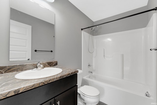 full bath with toilet, vanity, and bathtub / shower combination