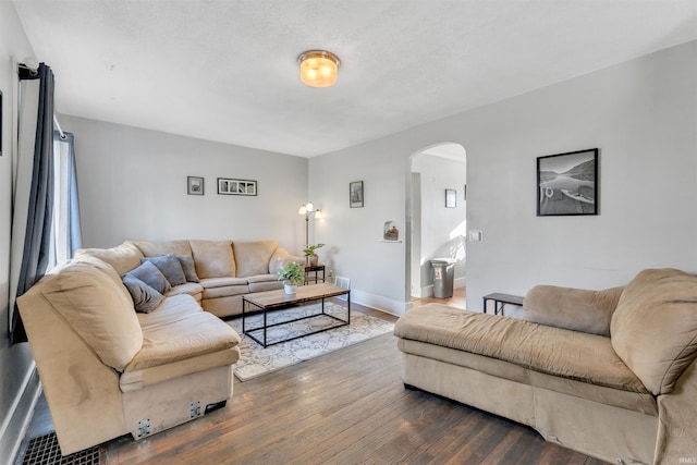 1820 Saint Marys Ave, Fort Wayne, IN 46808 - living area with arched walkways, wood finished floors, and baseboards