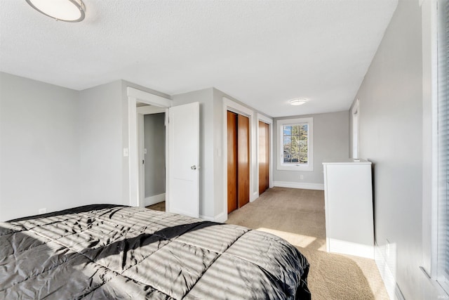 1820 Saint Marys Ave, Fort Wayne, IN 46808 - bedroom with light colored carpet, baseboards, and a textured ceiling