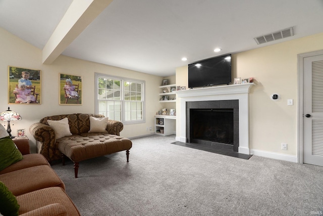 602 Cherokee Ave, Lafayette, IN 47905 - carpeted living area featuring a fireplace, baseboards, recessed lighting, and beam ceiling