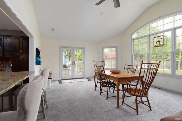 602 Cherokee Ave, Lafayette, IN 47905 - dining area with french doors, healthy amount of natural light, vaulted ceiling, light carpet, and ceiling fan
