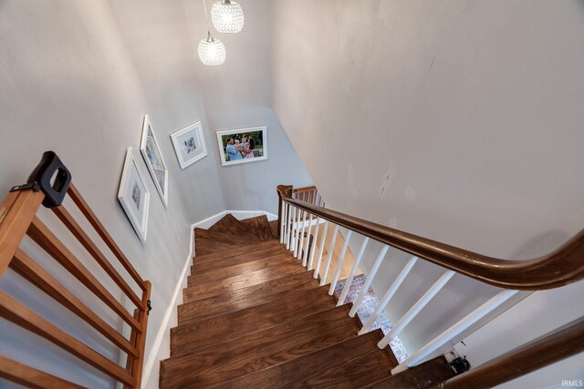 602 Cherokee Ave, Lafayette, IN 47905 - stairs with wood finished floors and a chandelier