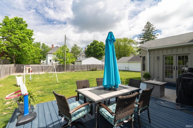 602 Cherokee Ave, Lafayette, IN 47905 - wooden terrace featuring outdoor dining area, french doors, and a grill