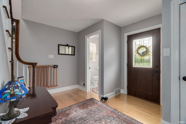602 Cherokee Ave, Lafayette, IN 47905 - foyer featuring light wood-style floors, baseboards, and stairs