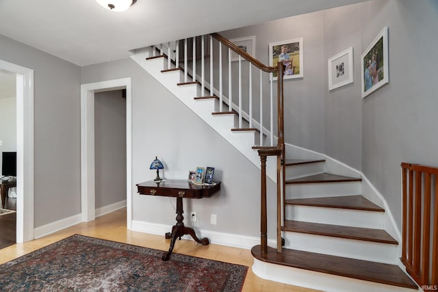 602 Cherokee Ave, Lafayette, IN 47905 - stairs featuring wood finished floors and baseboards