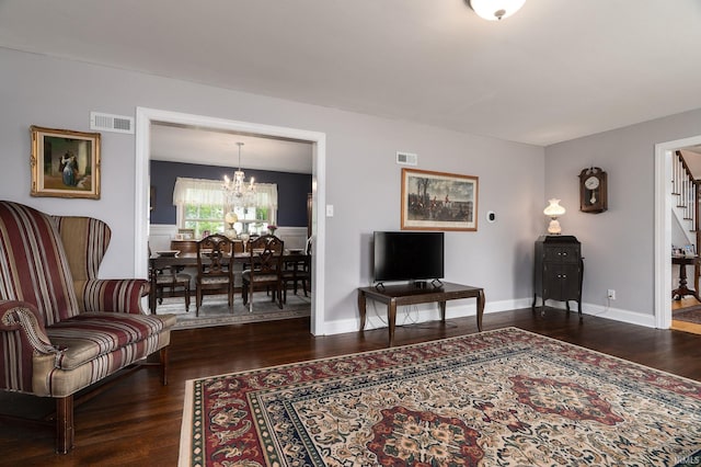 602 Cherokee Ave, Lafayette, IN 47905 - living room with stairway, wood finished floors, and a chandelier