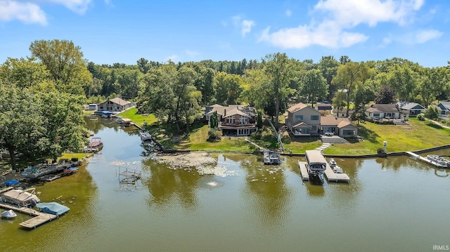 aerial view of residential area with a nearby body of water