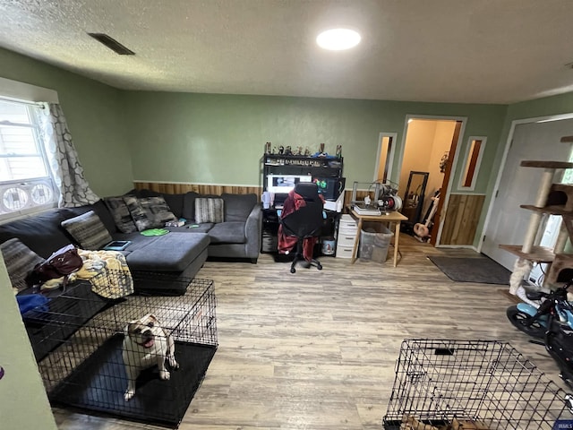 living room with wood finished floors