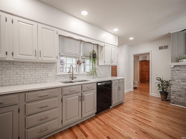 727 Mulberry St, Mount Vernon, IN 47620 - kitchen featuring black dishwasher, a sink, gray cabinetry, tasteful backsplash, and recessed lighting