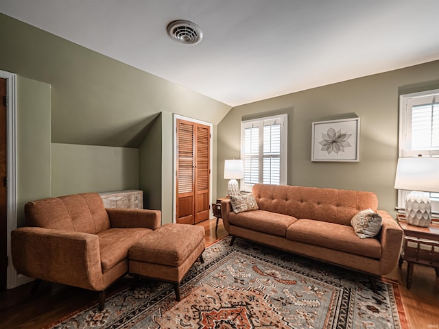 727 Mulberry St, Mount Vernon, IN 47620 - living room with wood finished floors, lofted ceiling, and plenty of natural light