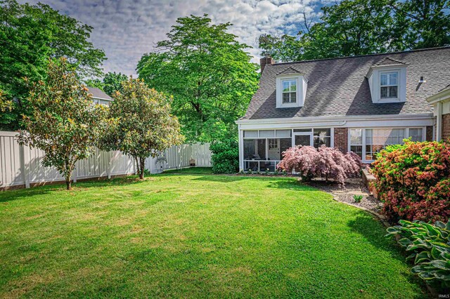 727 Mulberry St, Mount Vernon, IN 47620 - view of yard featuring a sunroom